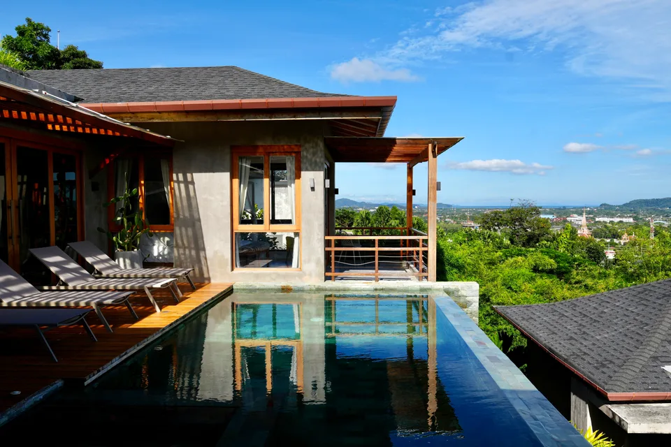 The villa and its infinity pool above Chalong